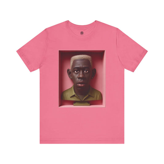 Pink t-shirt with a graphic of a bust in a box on a white background